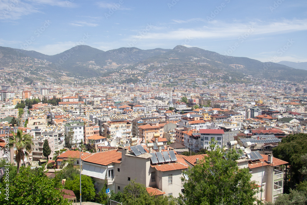 Mountains View of the city of Alanya and the roofs of houses