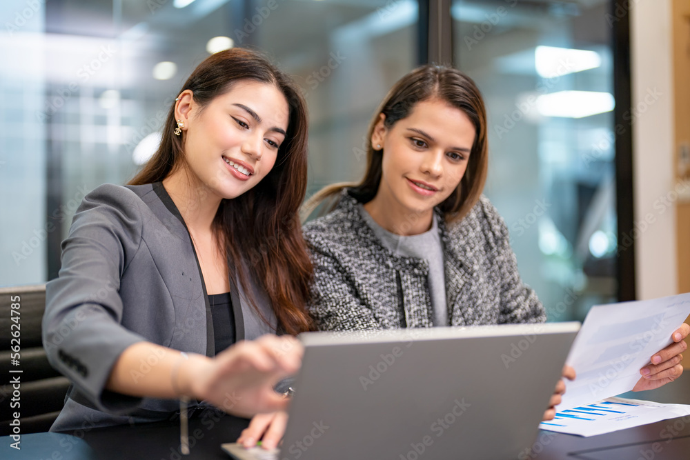 Businesswoman talking to colleague Businesswoman talking to colleague