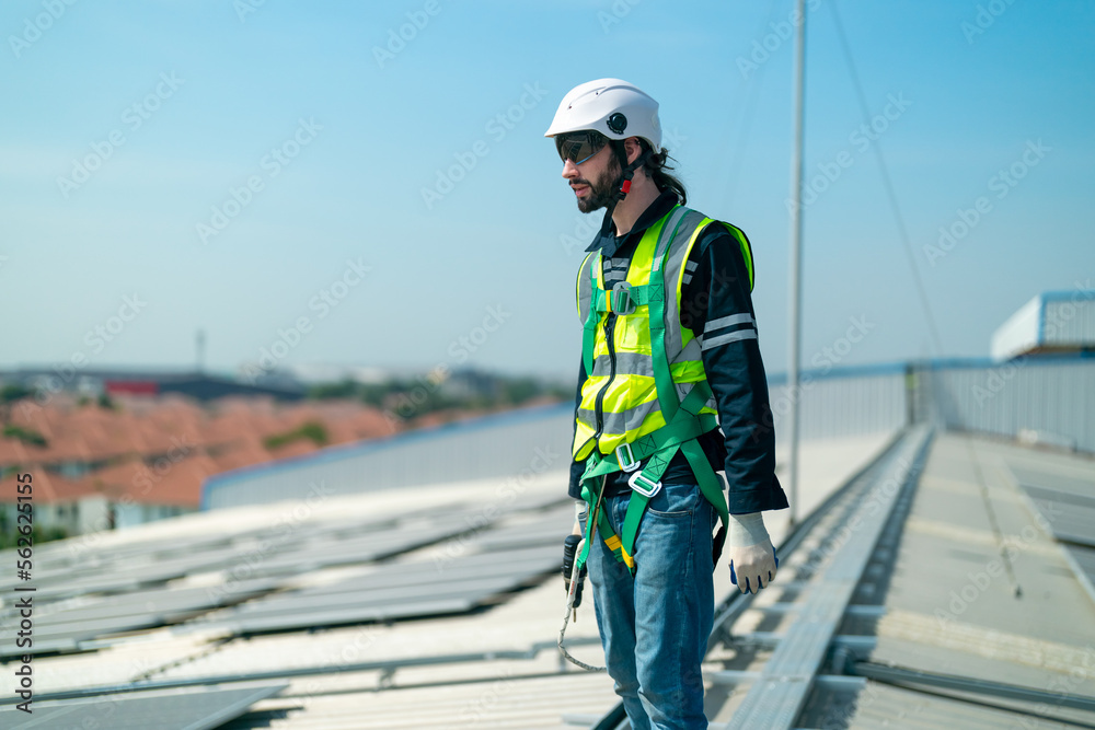 Professional worker installing solar panels on the roof. engineer working on checking equipment in solar power plant, Pure energy, Renewable energy. Professional worker installing solar panels on the roof. engineer working on checking equipment in solar power plant, Pure energy, Renewable energy.