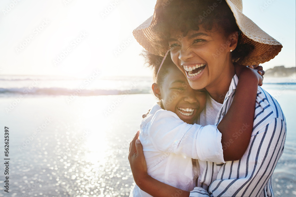 Family, kids and beach with a mother and daughter laughing or joking together in the ocean or sea. Love, children and coast with a black woman and girl having fun while bonding by the water in nature