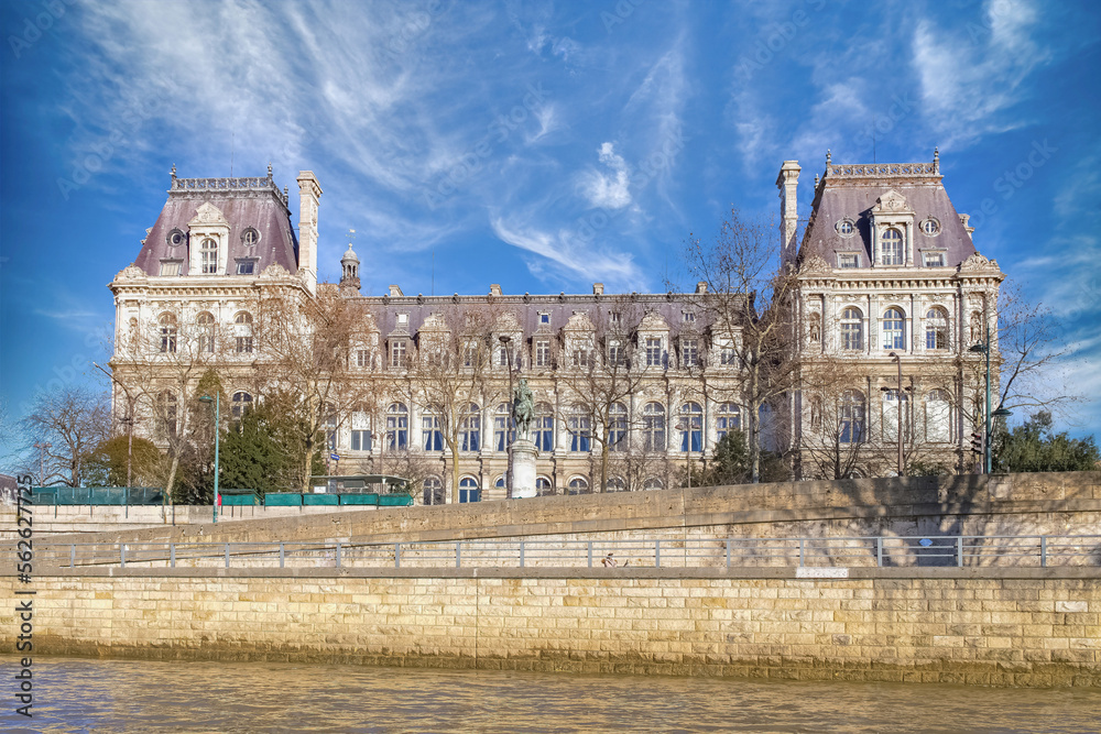 Paris, the facade of the Hotel de Ville, city hall of the french capital, view from the Seine
