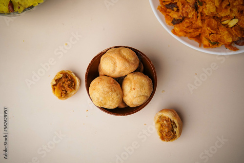 Top Shot Of Kachori in Wooden Bowl photo