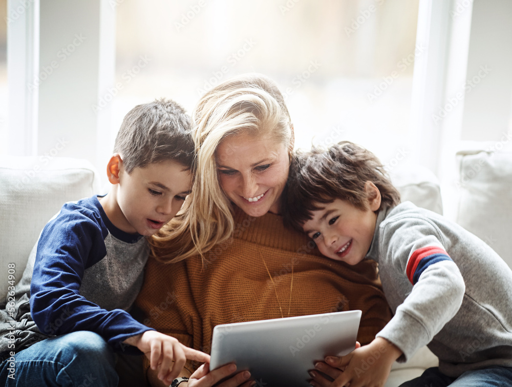 Love, tablet and mother with children on sofa bonding, quality time and relax on weekend together. Happy, family home and mom and kids with digital tech for online games, learning and internet app