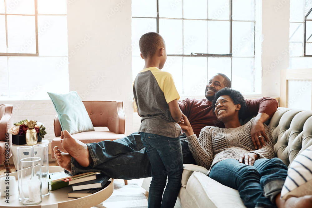 Relax happy black family child, parents or African people smile together, bonding and enjoy quality time. Happiness, love and young youth kid, easy father and mother lounge on home living room sofa Relax happy black family child, parents or African people smile together, bonding and enjoy quality time. Happiness, love and young youth kid, easy father and mother lounge on home living room sofa