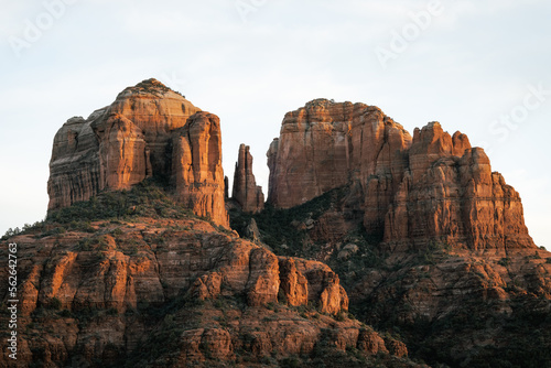 Tight shot zoomed in photograph of Cathedral rock in Sedona Arizona showing more detail of the red rock at sunset in the month of January.