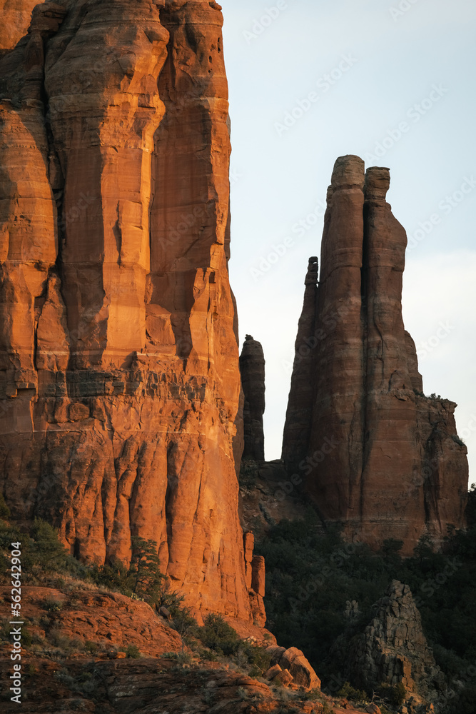 Tight shot zoomed in photograph of Cathedral rock in Sedona Arizona showing more detail of the red rock at sunset in the month of January.