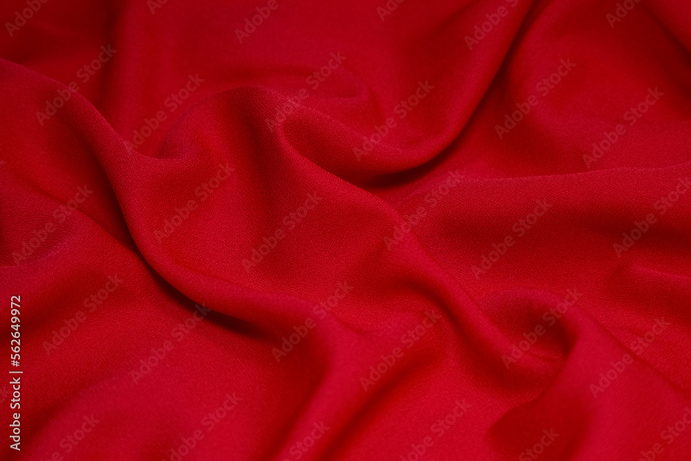 Red fabric background. Red cloth waves background texture. Red fabric cloth textile material. Red fabric background. Red cloth waves background texture. Red fabric cloth textile material.