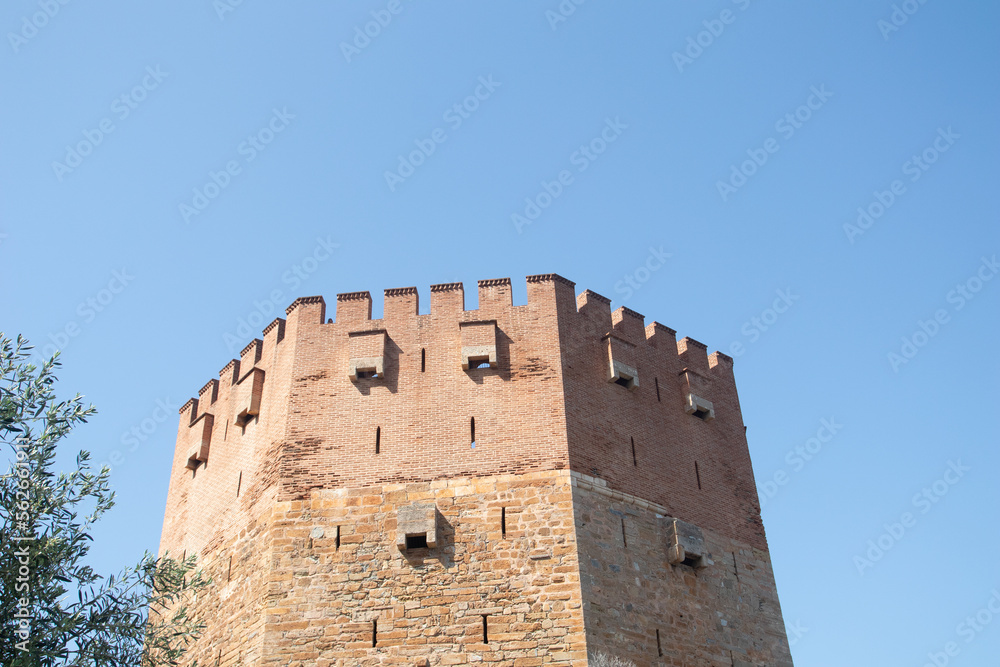 Red tower in Alanya. ancient stone fort of Alanya Castle,
