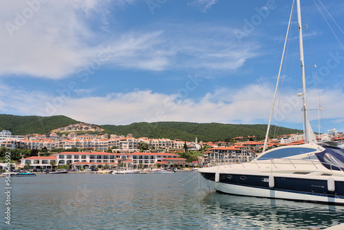 View of the yacht port and the city at the foot of the mountains, holiday resort in Europe