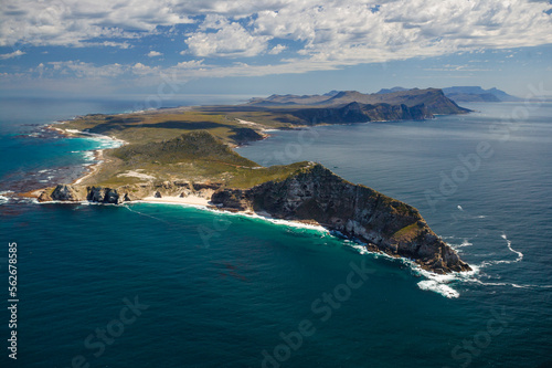 An aerial view of Cape Point and the Cape of Good Hope with Table Mountain in the distance. Cape Town. Western Cape. South Africa