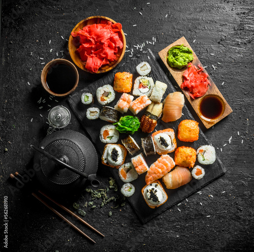 Japanese sushi rolls with salmon, avocado and shrimp.