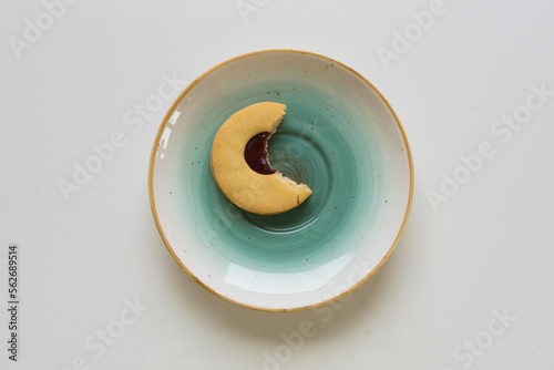 Biten cookie on the plate