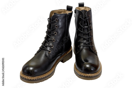 Autumn and winter women's black ankle boots with wool lining isolated on a background.