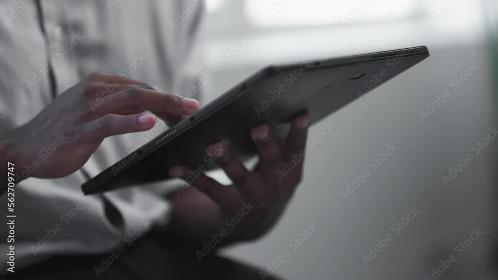 Digital marketing. Online research. Information technology. Unrecognizable business man hands using tablet working at virtual office.