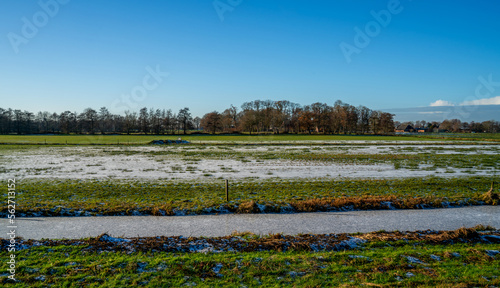 Winter landscape with frozen canal in Drenthe, Netherlands 