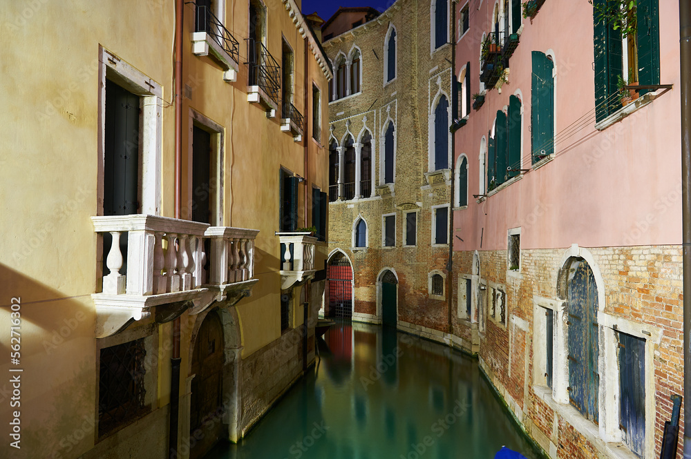 The city of Venice at night with a lonely and a little canal