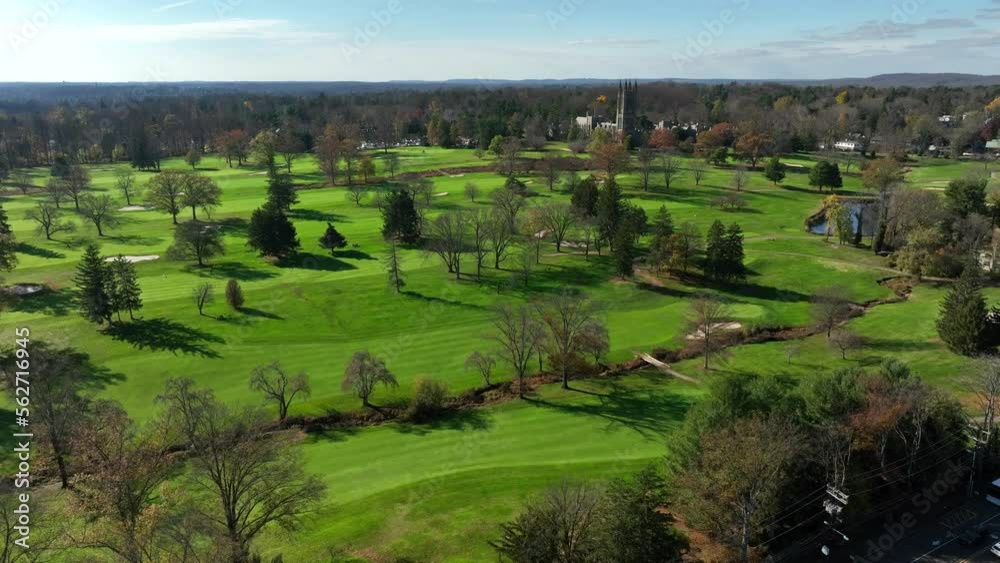 Winter view on sunny day of golf course greens. Aerial view over fairways Winter view on sunny day of golf course greens. Aerial view over fairways