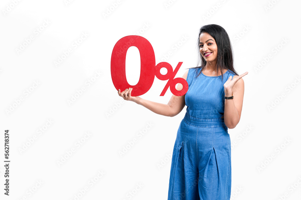 Indian woman showing zero percent sign board on white background. Indian woman showing zero percent sign board on white background.