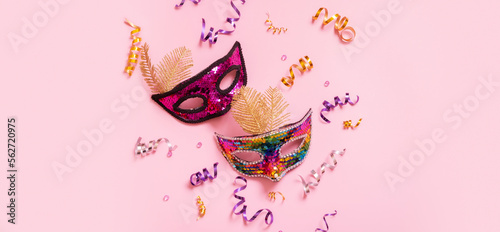 Schilderij op canvas Festive face mask for carnival or masquerade celebration on colored background