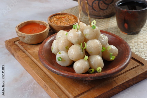 Cilok is Aci Dicolok, Traditional Street Food from West Java.Served with chilli and Peanut Sauce