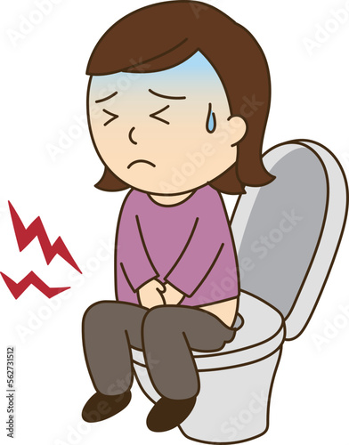 トイレで腹痛が辛そうな女性