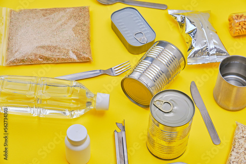Disaster preparation food on yellow background. 