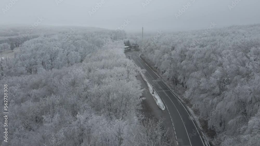 Curvy roads and frosty threes drone shot Curvy roads and frosty threes drone shot