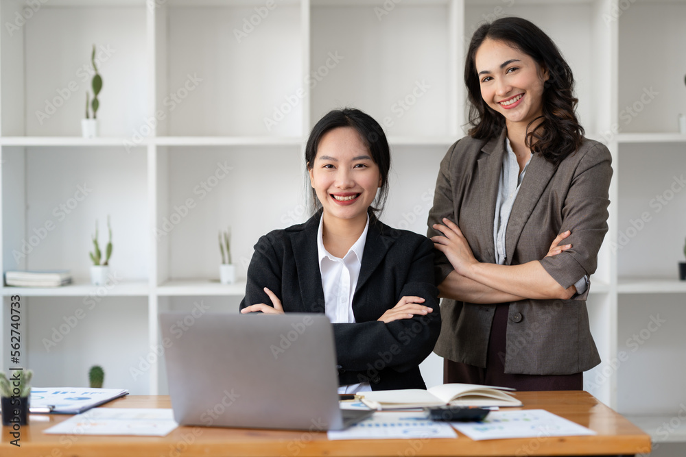 Business idea creative brainstorming sessions for projects Strategic topic of two Asian girls working together data analysis Happy clarification of various financial information at the desk. Business idea creative brainstorming sessions for projects Strategic topic of two Asian girls working together data analysis Happy clarification of various financial information at the desk.