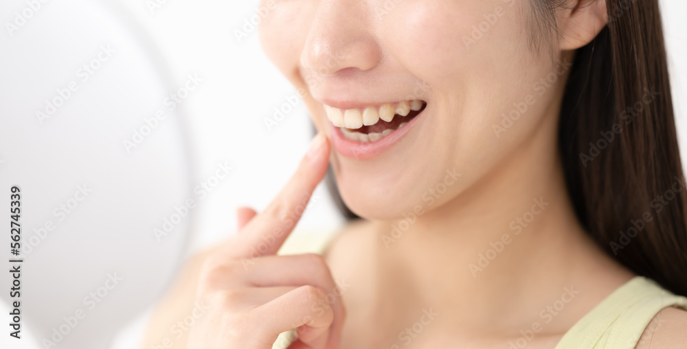 Obraz premium 綺麗な歯並びの女性 顔なし