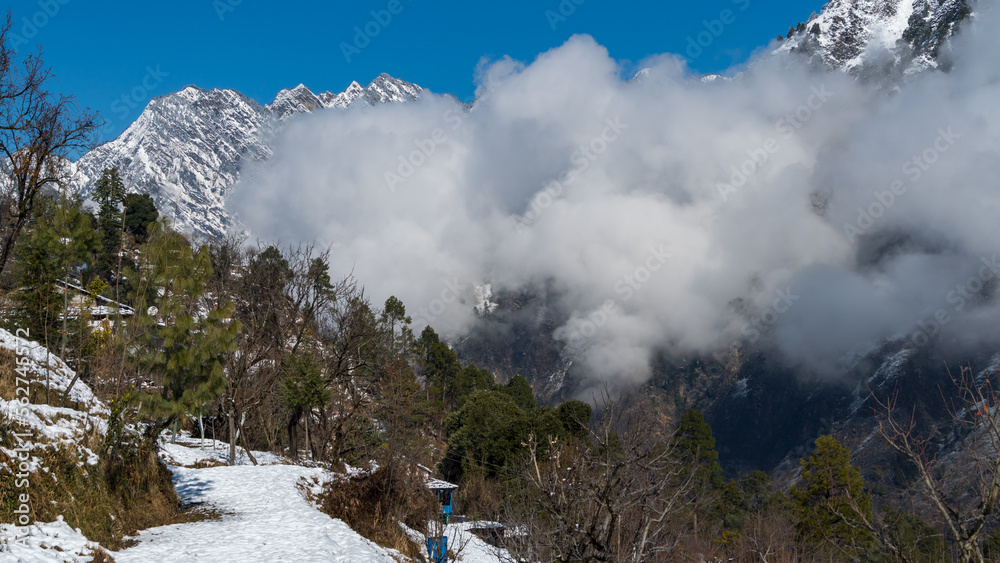 Himachal, India - Feb 6th, 2021 : Mountains landscape, Fog in Himalayas