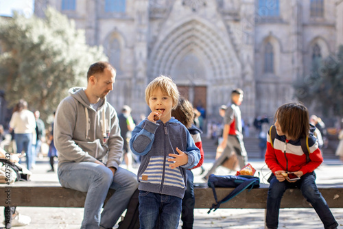 Cute little children tourists admiring Barcelona city, family travel with kids © Tomsickova
