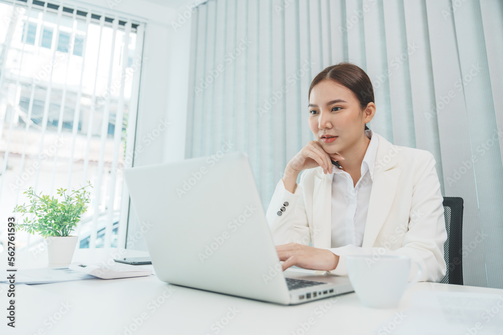 Confident young asian businesswoman working with tablet Start up small business owner. business successful technology concept Confident young asian businesswoman working with tablet Start up small business owner. business successful technology concept
