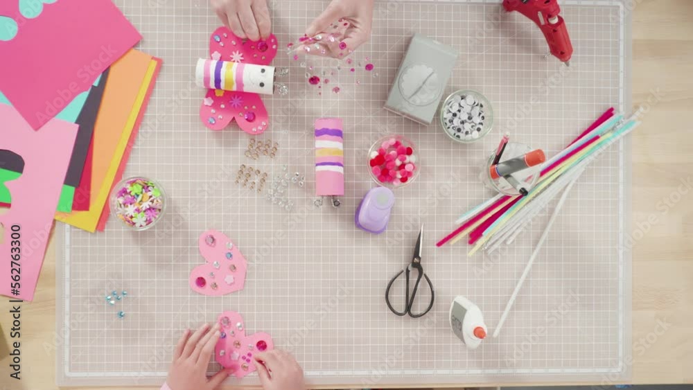 Flat lay. Kids papercraft. Making paper bugs out of the empty toilet paper rolls and construction paper. Flat lay. Kids papercraft. Making paper bugs out of the empty toilet paper rolls and construction paper.
