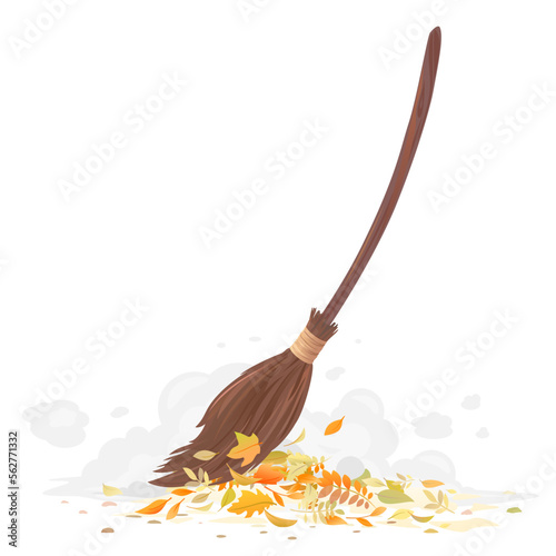 One brown broom with long wooden handle cleaning fallen leaves isolated, sweeping fallen leaves, broom sweeps the ground from the fallen orange leaves