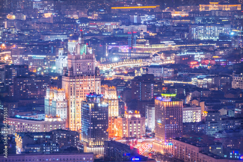 View of the city from the observation deck to skyscrapers in the light of night lights  the Ministry of Foreign Affairs and the Cathedral of Christ the Savior  Moscow City