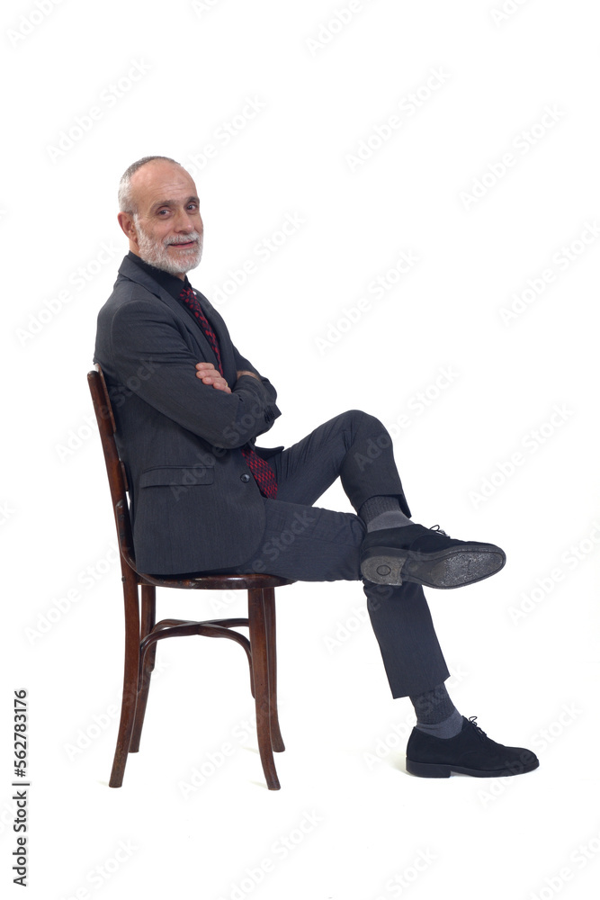 man sitting cross legged side view
