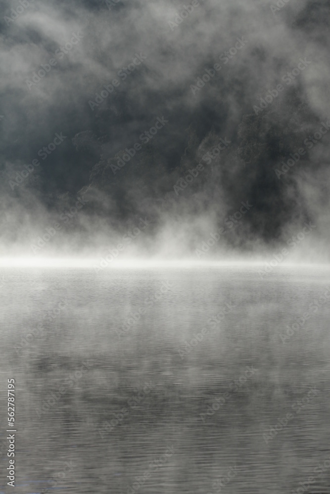 Fototapeta premium Misty nature background of mountain lake