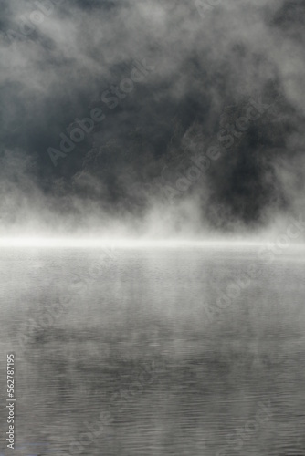 Misty nature background of mountain lake