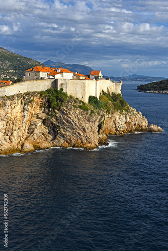 Dubrovnik West Harbor and view to the ancient city wall on the rocks  Dubrovnik  Croatia