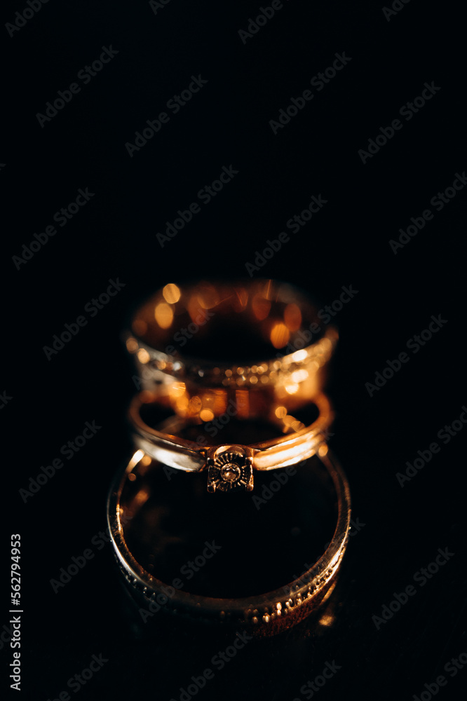 wedding rings on a black background wedding rings on a black background