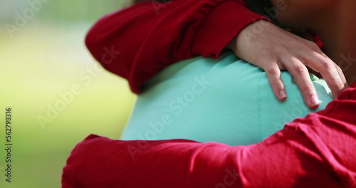 Female friend hug close-up. Girlfriend wrapping arms around in empathic embrace