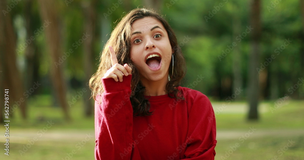 Girl having an idea feeling surprised. Young woman having an epiphany enlightenment