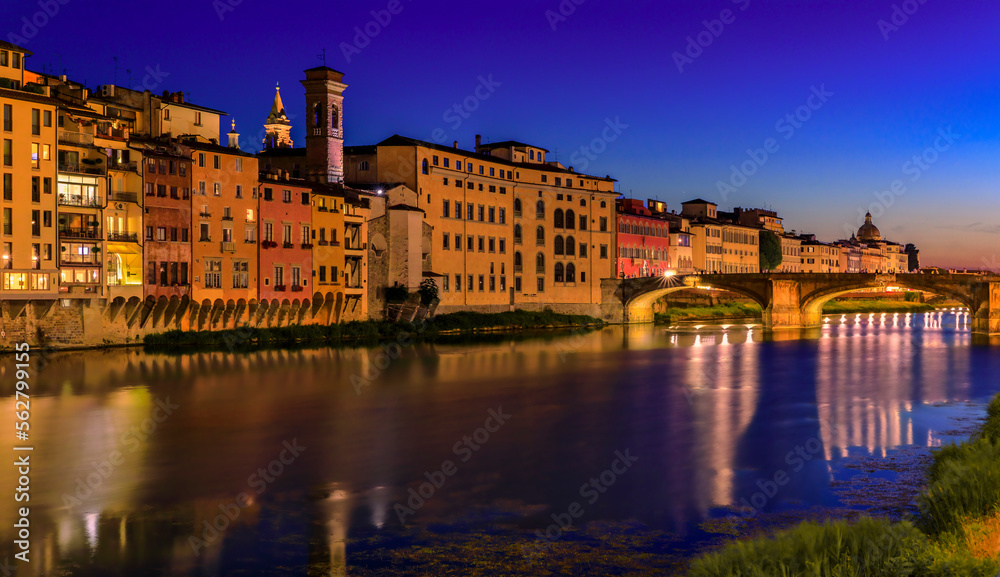 Ponte Santa Trinita bridge on Arno River at sunset, Florence, Italy at sunset