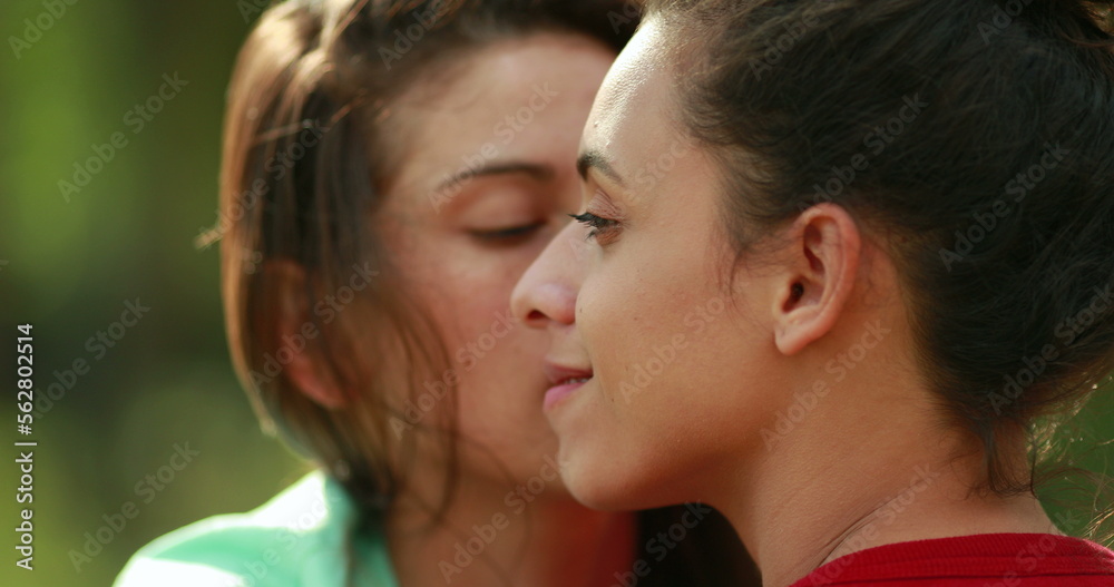 Candid LGBT lesbian interaction between two lovers, real life smile and laugh Candid LGBT lesbian interaction between two lovers, real life smile and laugh