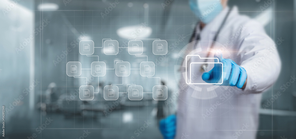 Doctor working with documents case histories . Doctor working with documents case histories .