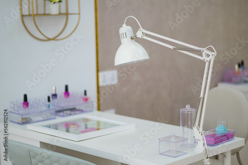 Room for manicure with two working places in the beauty salon. modern nail salon room