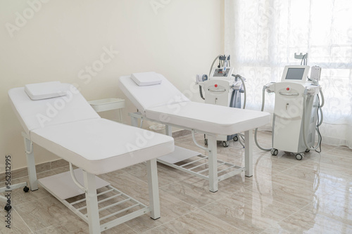 Laser epilation machine with 2 white bads in the beauty salon. Laser systems and devices for aesthetic medicine and surgery. Cosmetology devices.Modern ways of relaxation and skin care. © Galina