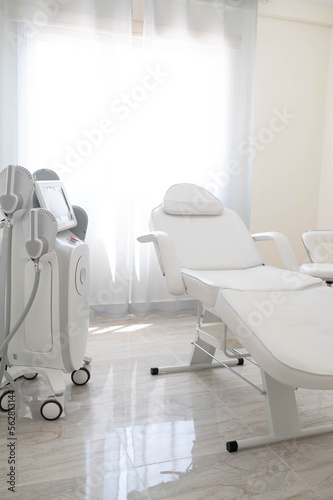 The sculp body treatment machine with a white bad in the white room, cabinet in the cosmetology, beauty center, clinic, salon.Cosmetology devices.Modern ways of relaxation and skin care © Galina