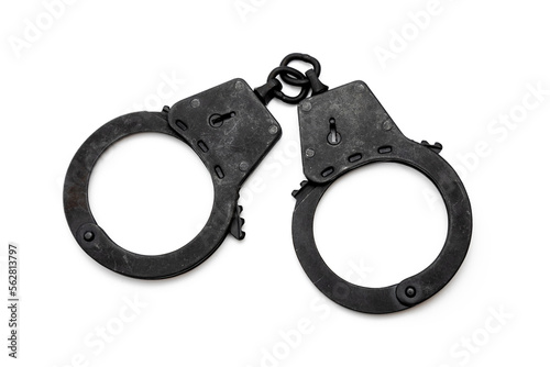 metal police handcuffs in black on a white background