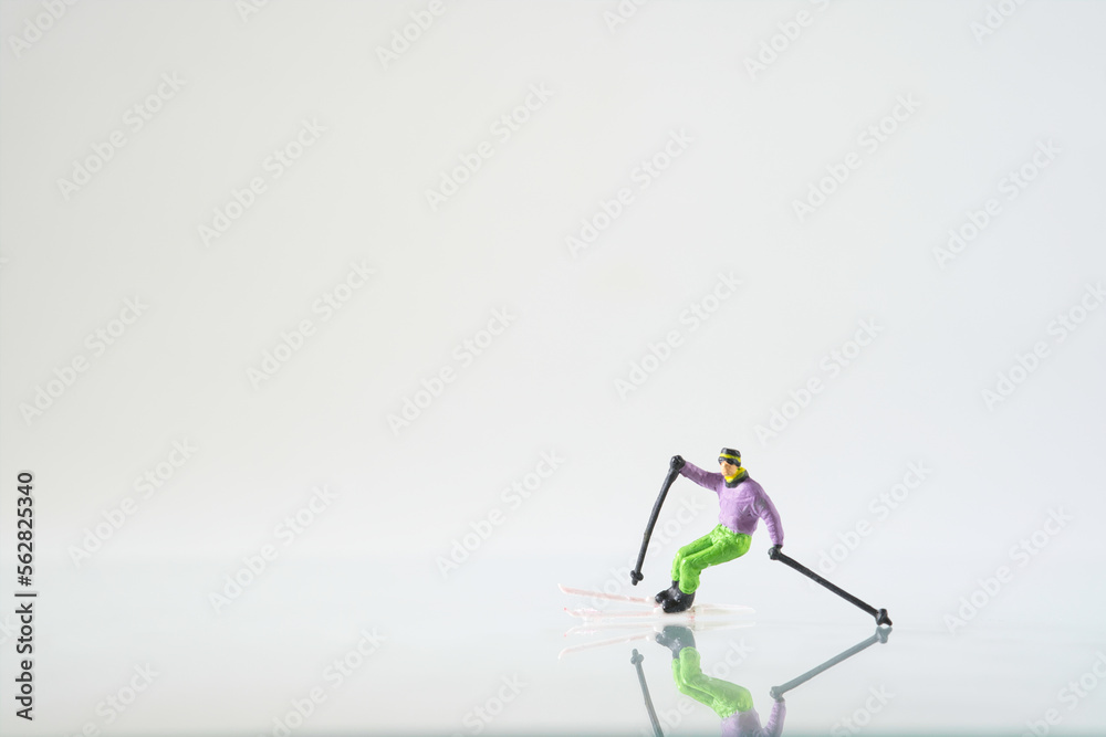 Naklejka premium Skier in action on white background